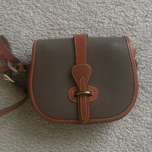 EUC Vintage Dooney & Bourke arrow head x-body bag. Purchased from outlet. No tag